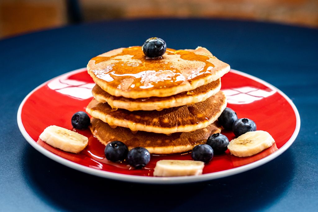 Making pancakes, making baking pancakes, with fresh fruits